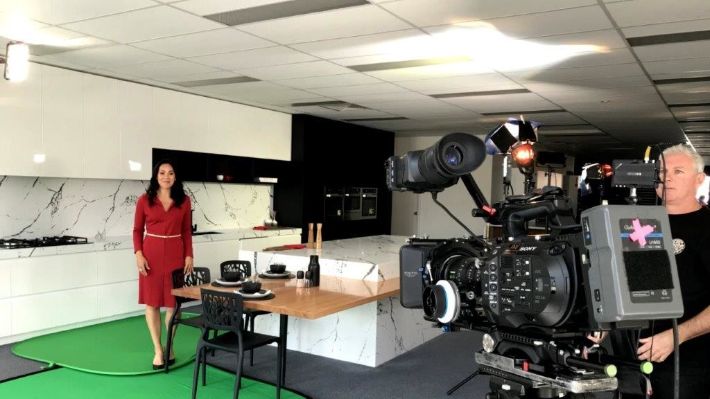 DRTV Ad Presenter on set of production shoot