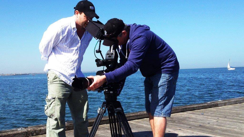 Director and Camera Operator shooting video footage