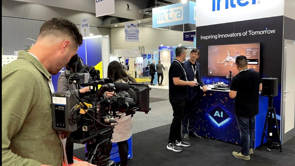 Camera Operator shooting a demo at an expo